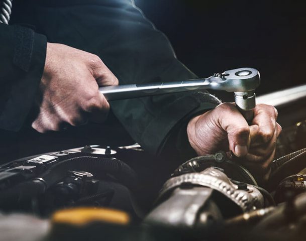 Mechanic fixing engine with wrench