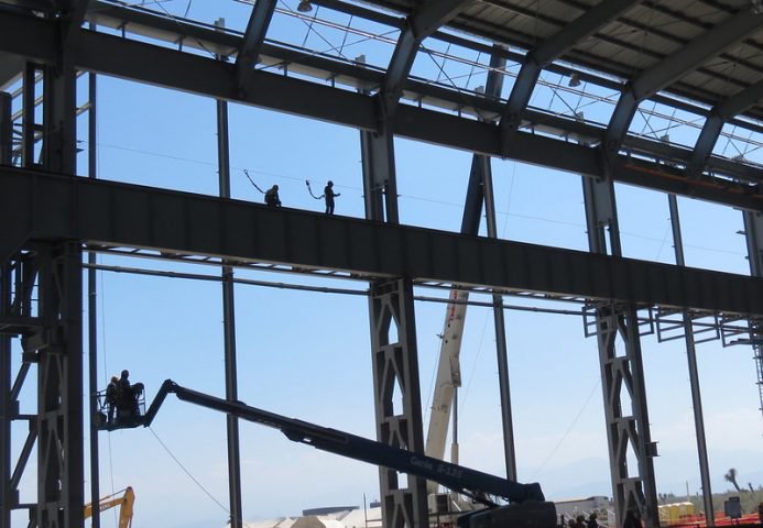 workers on high scaffolding