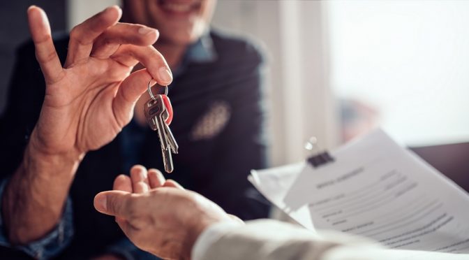 landlord handing keys